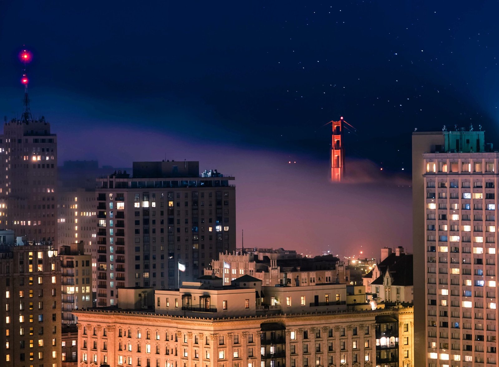 ariel shot of building in san francisco at night time